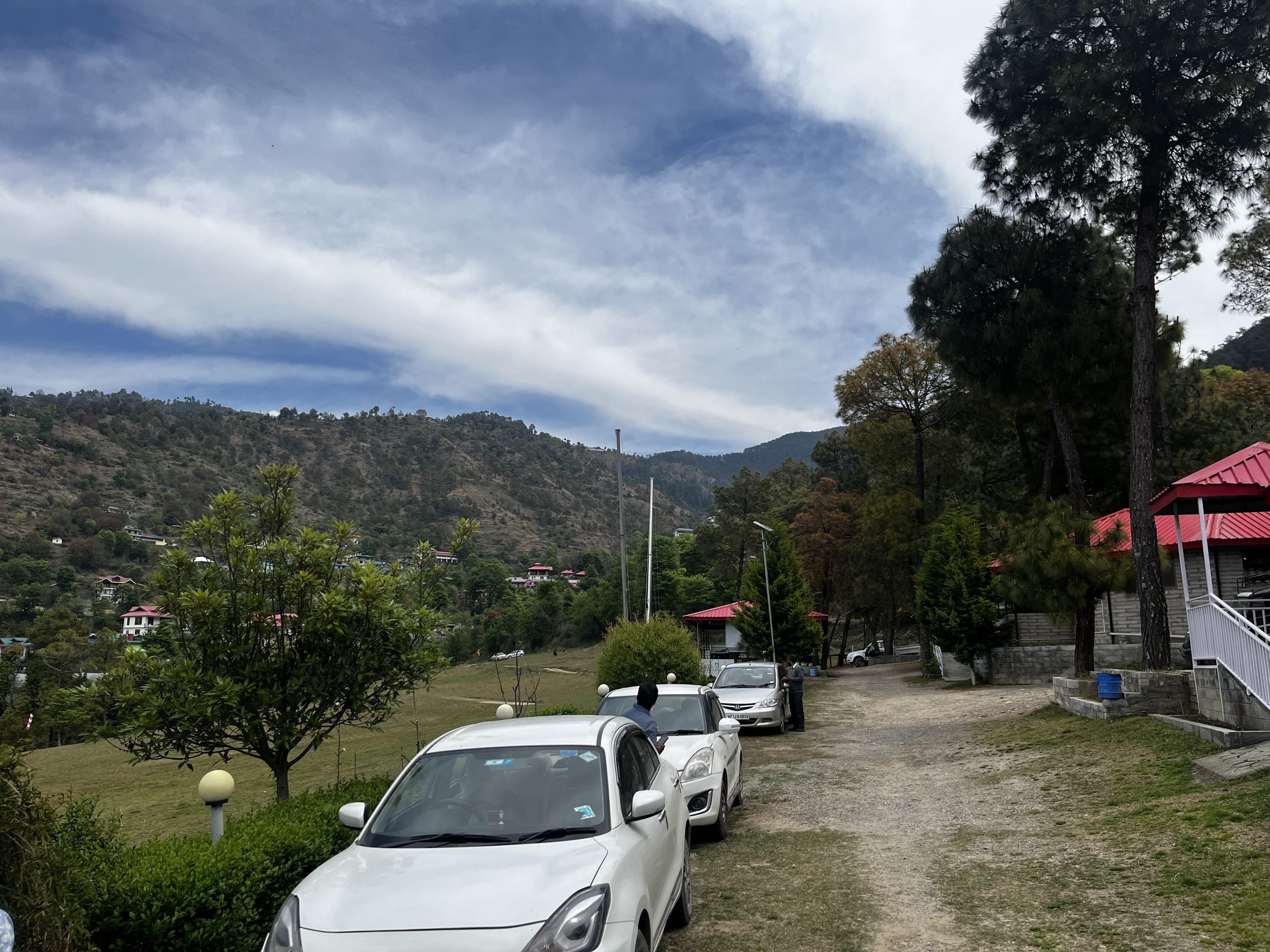 Lush green resort grounds at The Glide Inn, Junga, Shimla